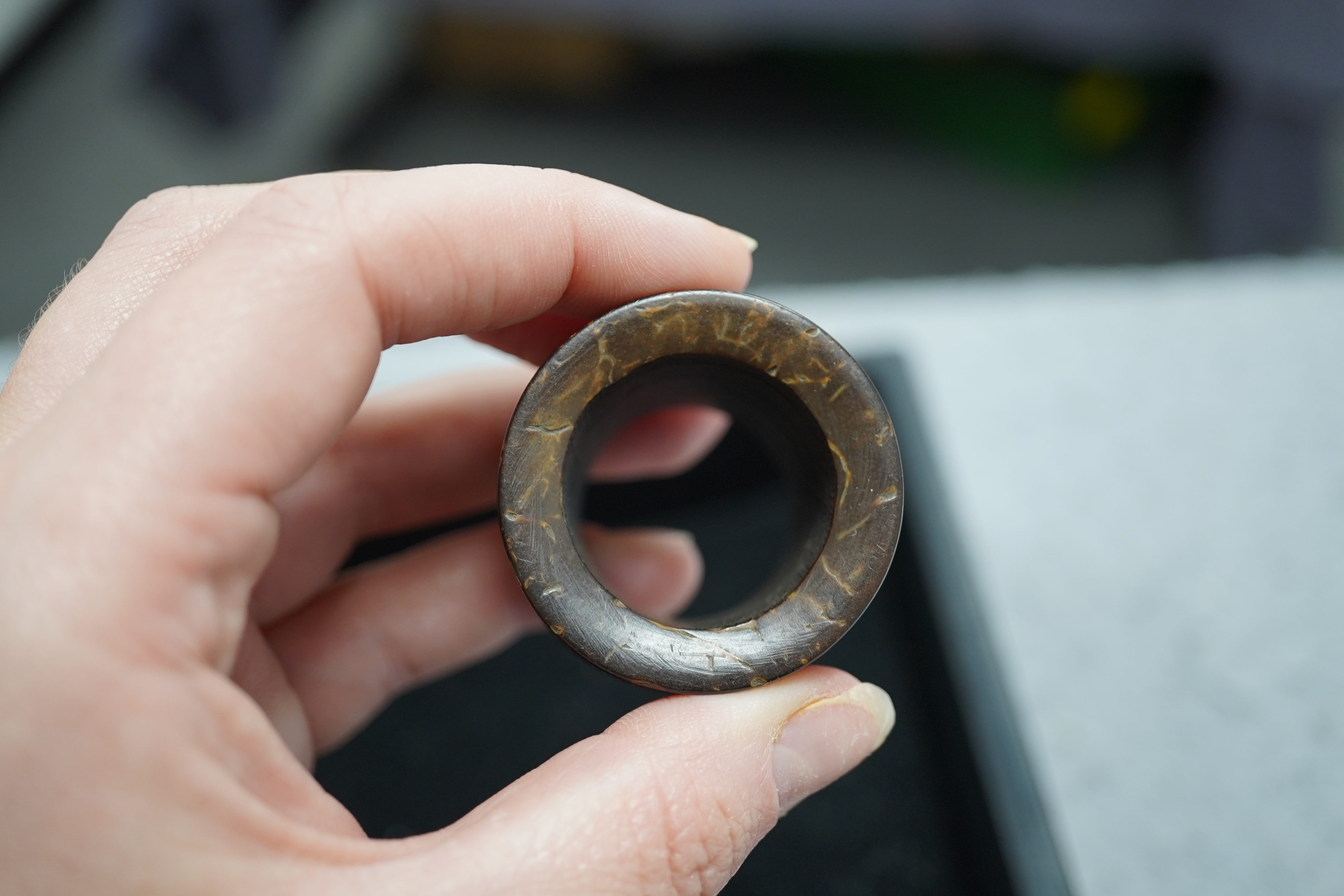 A pair of rare Chinese Straits palm wood archer's thumb rings, 19th century